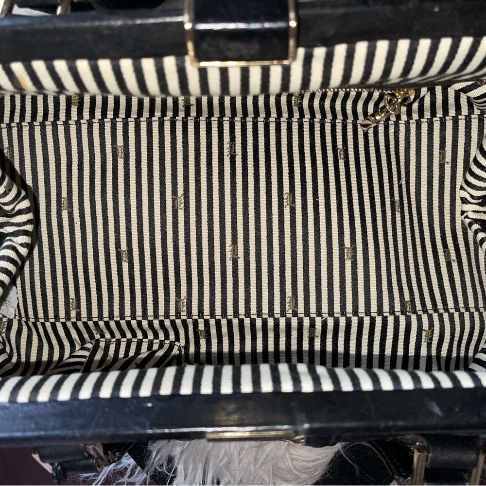 Authentic Black and cream L.A.M.B
Satchel Handbag by Gwen Stefani - Picture 7 of 14